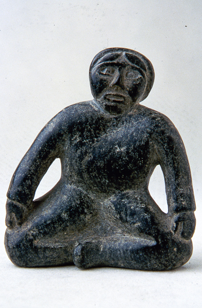 Figure Sitting Cross-Legged