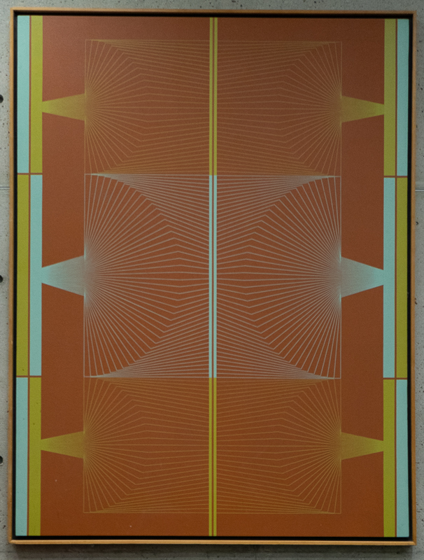 Geometric linear fan pattern in primarily orange, yellow, and white.
