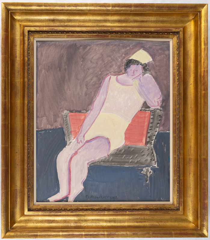 Girl in a swimsuit reclining in a chair with an orange cushion. Her hat looks like a nurse cap, but it isn't.